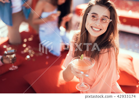 Happy female drinking alcohol liquid Happy female drinking alcohol liquid 42933174