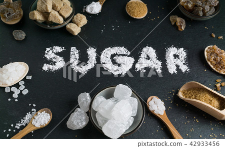 Sugar variation set on dark stone background Sugar variation set on dark stone background 42933456