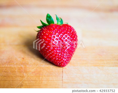 Strawberry on a wooden board Strawberry on a wooden board 42933752