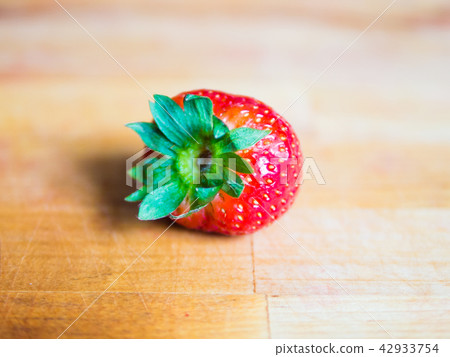 Strawberry on a wooden board Strawberry on a wooden board 42933754