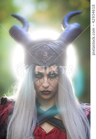 Terrible Woman With Black Horns Silver Hair Stock Photo