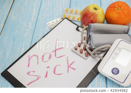 Medical pills against hypertension, equipment for measuring blood pressure in the background, the 42934982