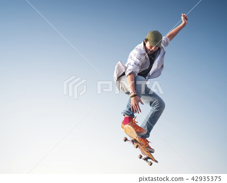 Skater on the sky background. Sport and active 42935375