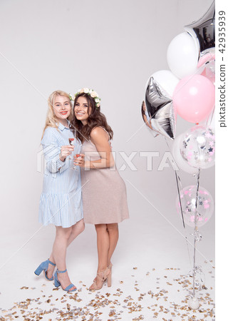 Smiling girlfriends having fun celebrating bachelorette party 42935939