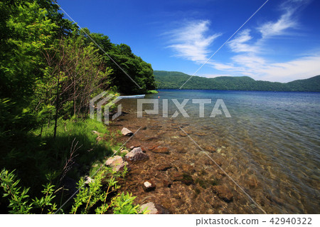 On the banks of Lake Kutakura in the summer On the banks of Lake Kutakura in the summer 42940322