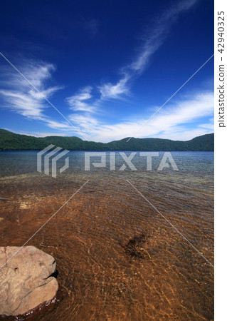 On the banks of Lake Kutakura in the summer On the banks of Lake Kutakura in the summer 42940325