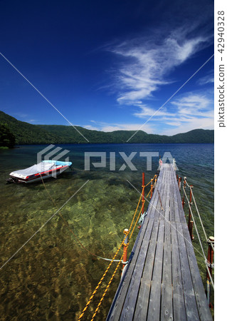 On the banks of Lake Kutakura in the summer On the banks of Lake Kutakura in the summer 42940328