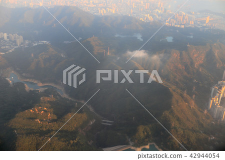 view of plane window looking down of a land view of plane window looking down of a land 42944054