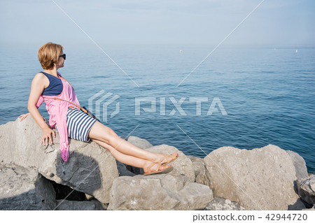 Woman posing with Adriatic Sea, Miramare castle 42944720