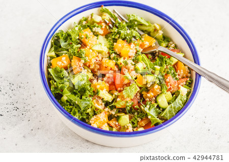 Vegan healthy rainbow salad with quinoa, tofu 42944781