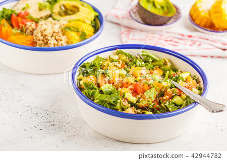 Vegan healthy rainbow salad with quinoa, tofu 42944782
