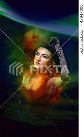 Portrait of attractive witch for Halloween Portrait of attractive witch for Halloween 42947000