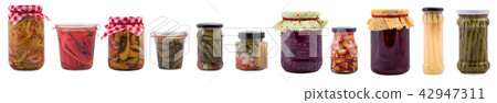 Wide banner with preserved food in jars, isolated  42947311