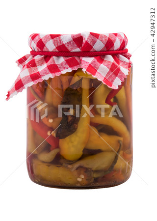 Jar with preserved food  pepper, isolated on white 42947312