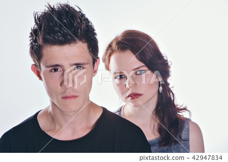 beautiful couple looking at the camera beautiful couple looking at the camera 42947834