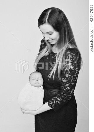 baby on the hands of mother. woman and child baby on the hands of mother. woman and child 42947932