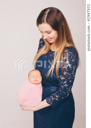 baby on the hands of mother. woman and child baby on the hands of mother. woman and child 42947933