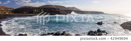 black sand beach in Lanzarote on sunset black sand beach in Lanzarote on sunset 42949694