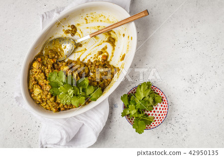 Lentil curry in white dish, Indian cuisine Lentil curry in white dish, Indian cuisine 42950135