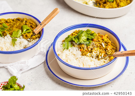 Lentil curry with rice, Indian cuisine, tarka dal Lentil curry with rice, Indian cuisine, tarka dal 42950143