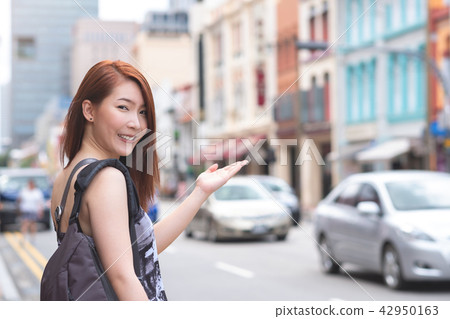 Young asian woman with smile travel in Singapore 42950163