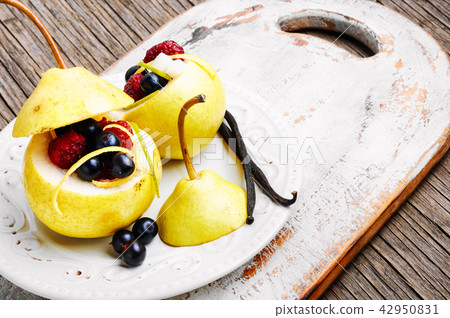 Pear with berry stuffing 42950831