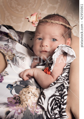 baby on the hands of mother. woman and child baby on the hands of mother. woman and child 42950861