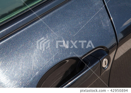 a black car detail: car door close-up. a black car detail: car door close-up. 42950894