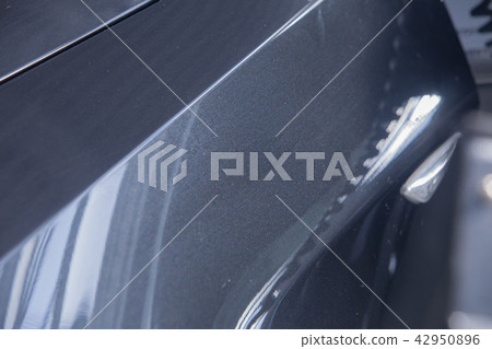 a black car detail: car door close-up. a black car detail: car door close-up. 42950896
