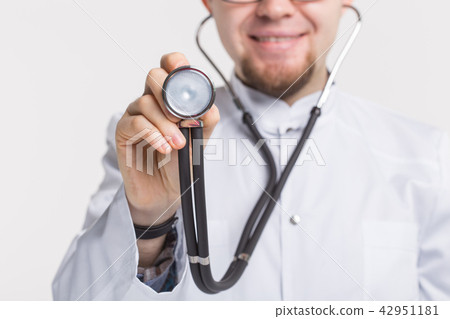 Closeup picture of stethoscope in docror's hand Closeup picture of stethoscope in docror's hand 42951181