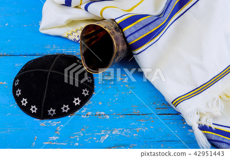 Shofar kippah tallit on white prayer talit. Shofar kippah tallit on white prayer talit. 42951443