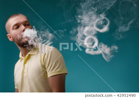 vaping man launches ring of the smoke vaping man launches ring of the smoke 42952490