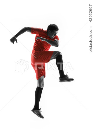 Professional football soccer player isolated on white background 42952697