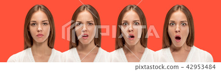Beautiful woman looking suprised isolated on red Beautiful woman looking suprised isolated on red 42953484