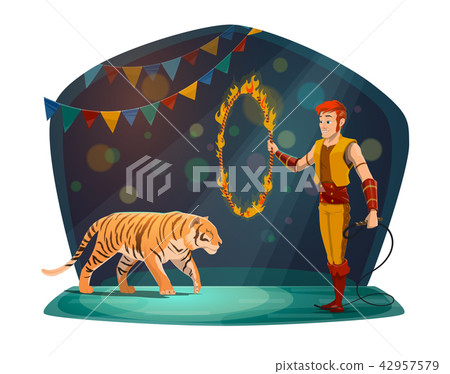 Handler with tiger jumping in fire on circus arena 42957579