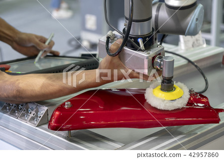 The engineer setup the robot arm The engineer setup the robot arm 42957860