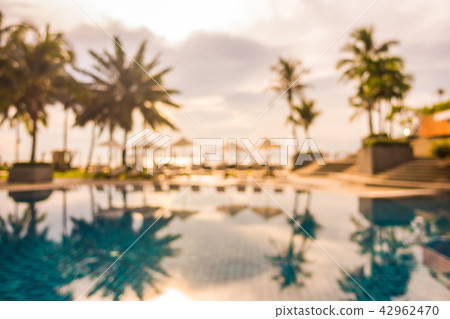 Abstract blur and defocused beautiful outdoor swimming pool in hotel and resort 42962470