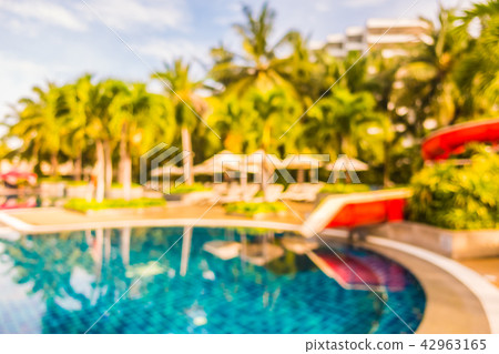 Abstract blur and defocused beautiful outdoor swimming pool in hotel and resort 42963165