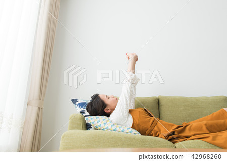 A woman relaxing at home 42968260