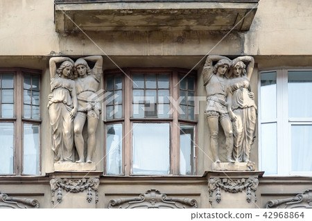 Decorated facade detail of the building Decorated facade detail of the building 42968864