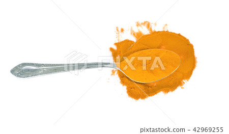 Turmeric Powder in the spoon on white background. Turmeric Powder in the spoon on white background. 42969255