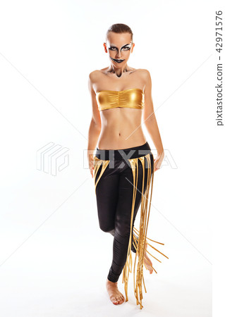 Girl with clown makeup dances 42971576