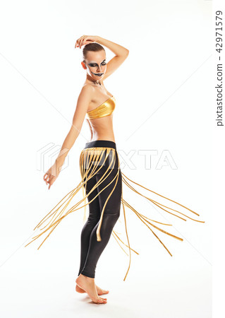 Girl with clown makeup dances 42971579