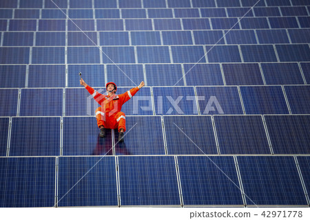 Engineers are checking the solar panel maintenance Engineers are checking the solar panel maintenance 42971778