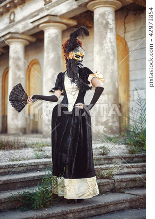 Red-haired lady in mask Red-haired lady in mask 42971854