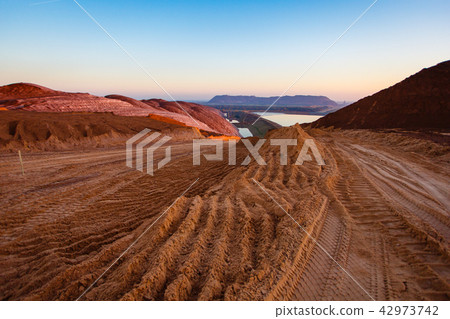 Sand waste hills in industrial area top view Sand waste hills in industrial area top view 42973742