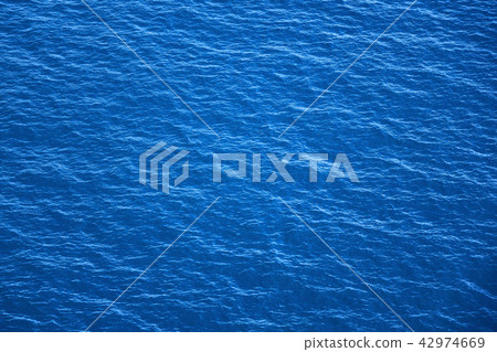 Background of blue sea surface and waves close up Background of blue sea surface and waves close up 42974669