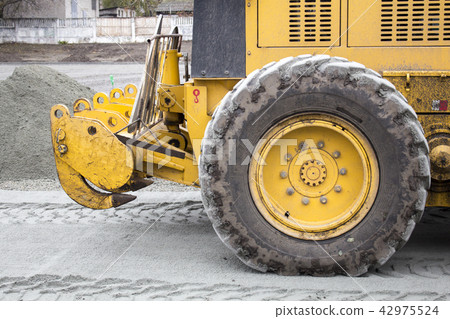 Men at work, asphalt laying. Road-building. Road  42975524