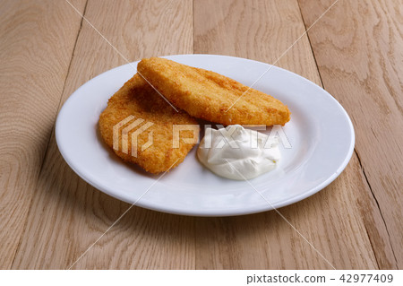 Potato cutlet in breading stuffed with ham  42977409