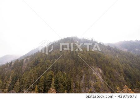 Mountains against the blue sky Mountains against the blue sky 42979678